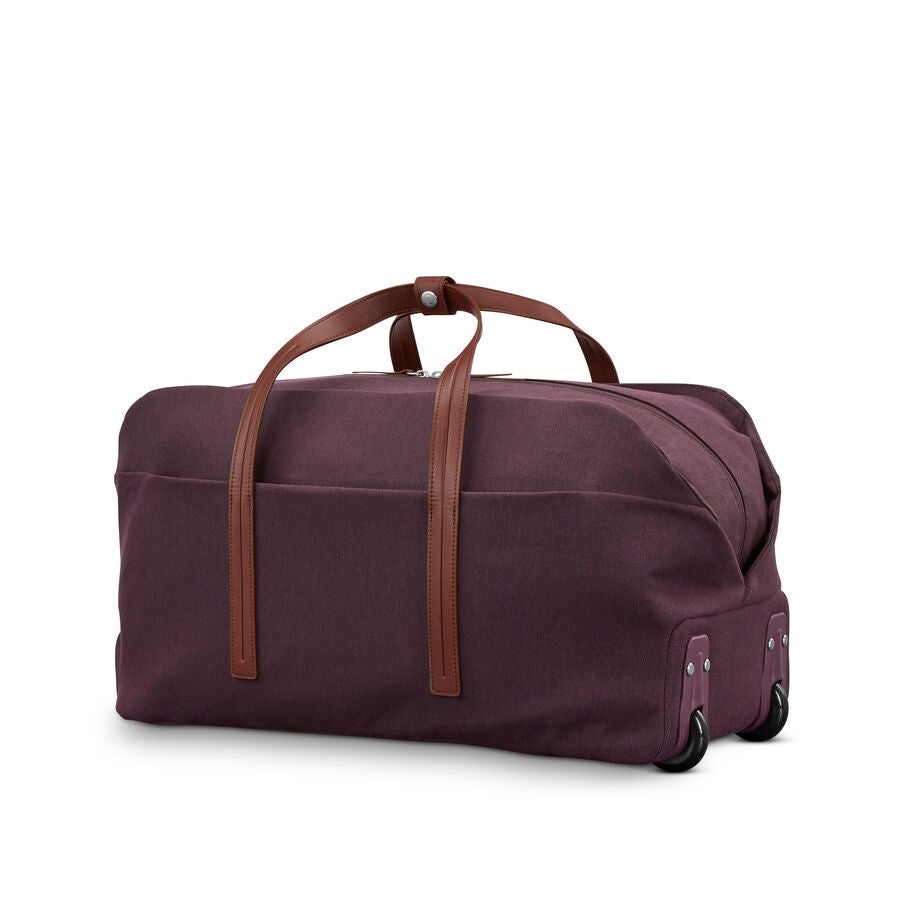 Virtuosa Wheeled Duffel in the color Merlot. image number 6