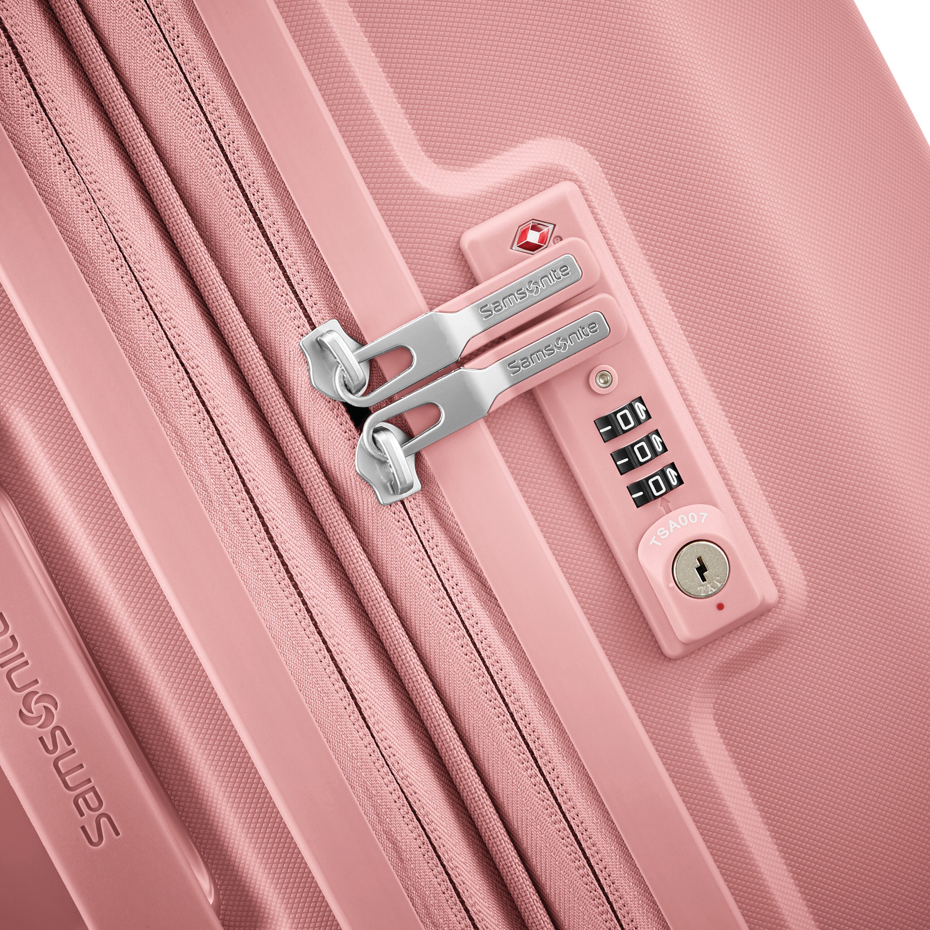 Samsonite light pink luggage top