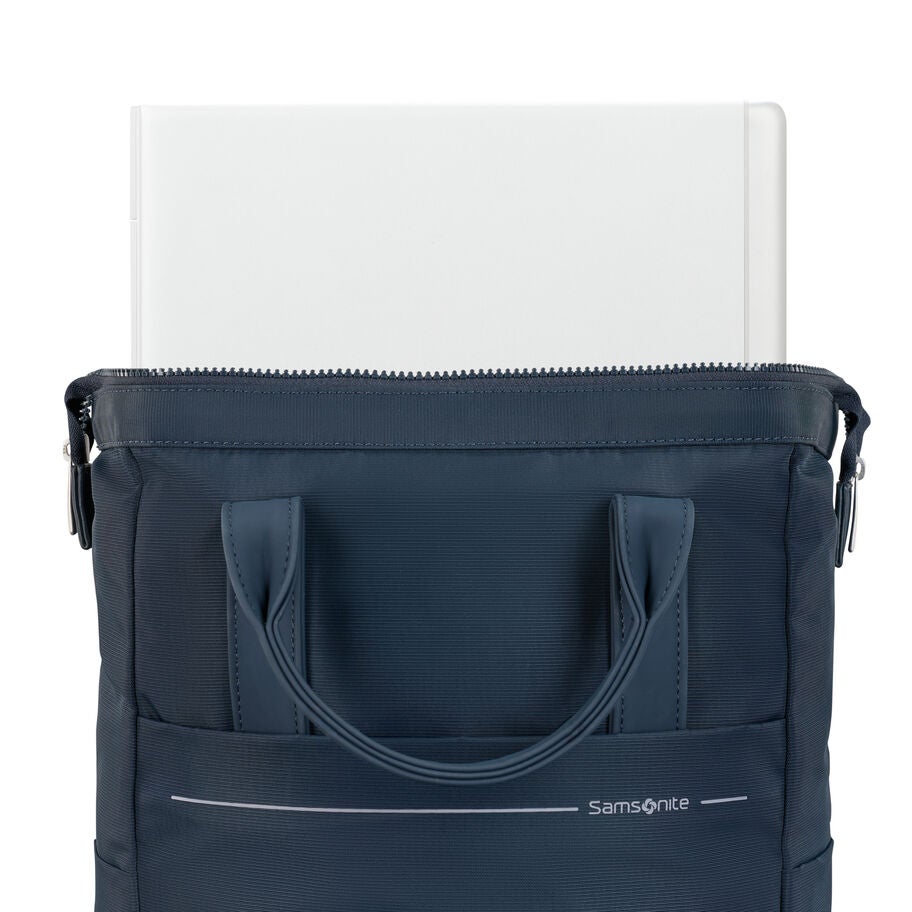 Back of blue Samsonite backpack with laptop partially inserted