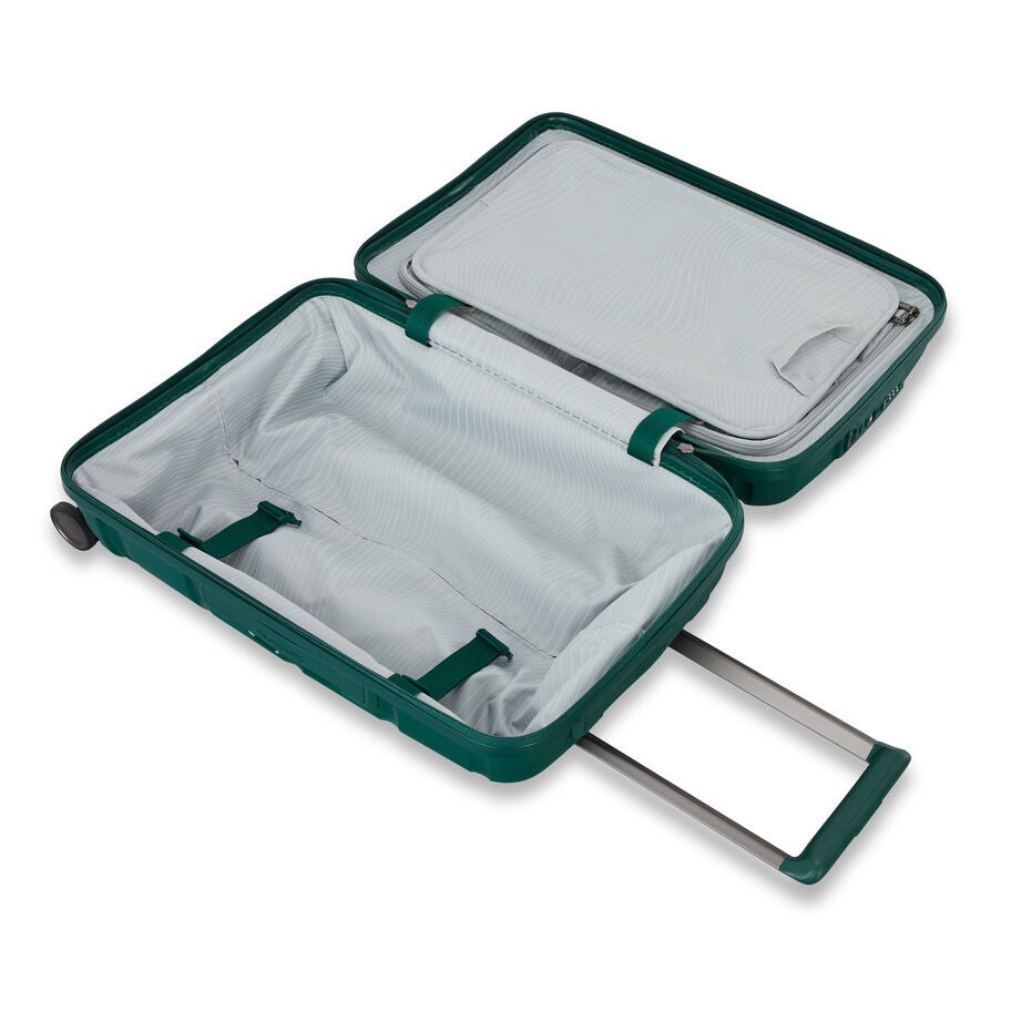 Open teal green carry-on interior with packing straps and divider