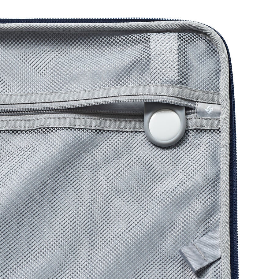 Interior mesh pocket and zippers on Paralux suitcase