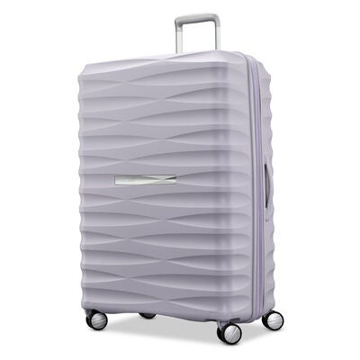 Voltage DLX Large Spinner in the color Lilac.