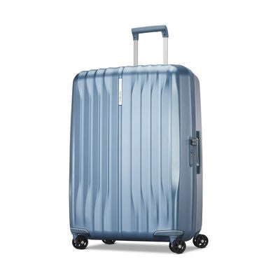 UpLIFT Hardside Large Spinner in the color Elemental Blue.