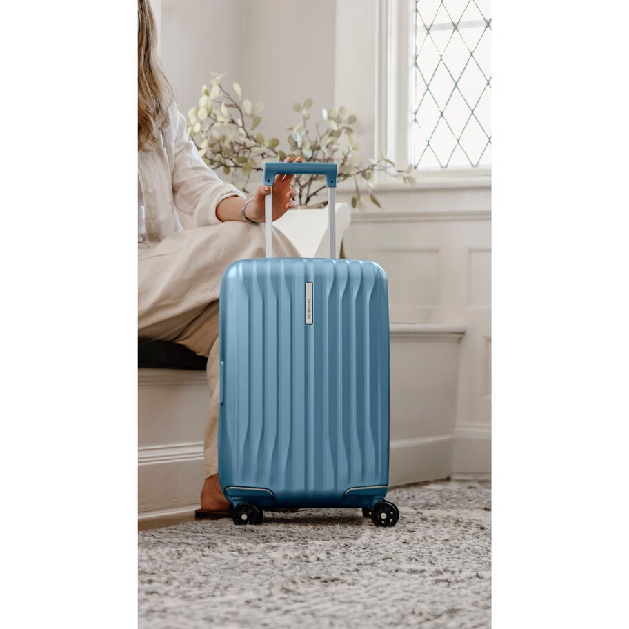 UpLIFT Hardside Carry-On Spinner in the color Elemental Blue. image number 6