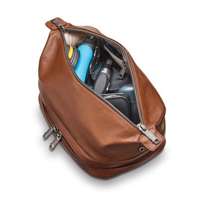Classic Leather Zip Bottom Travel Kit in the color Cognac.