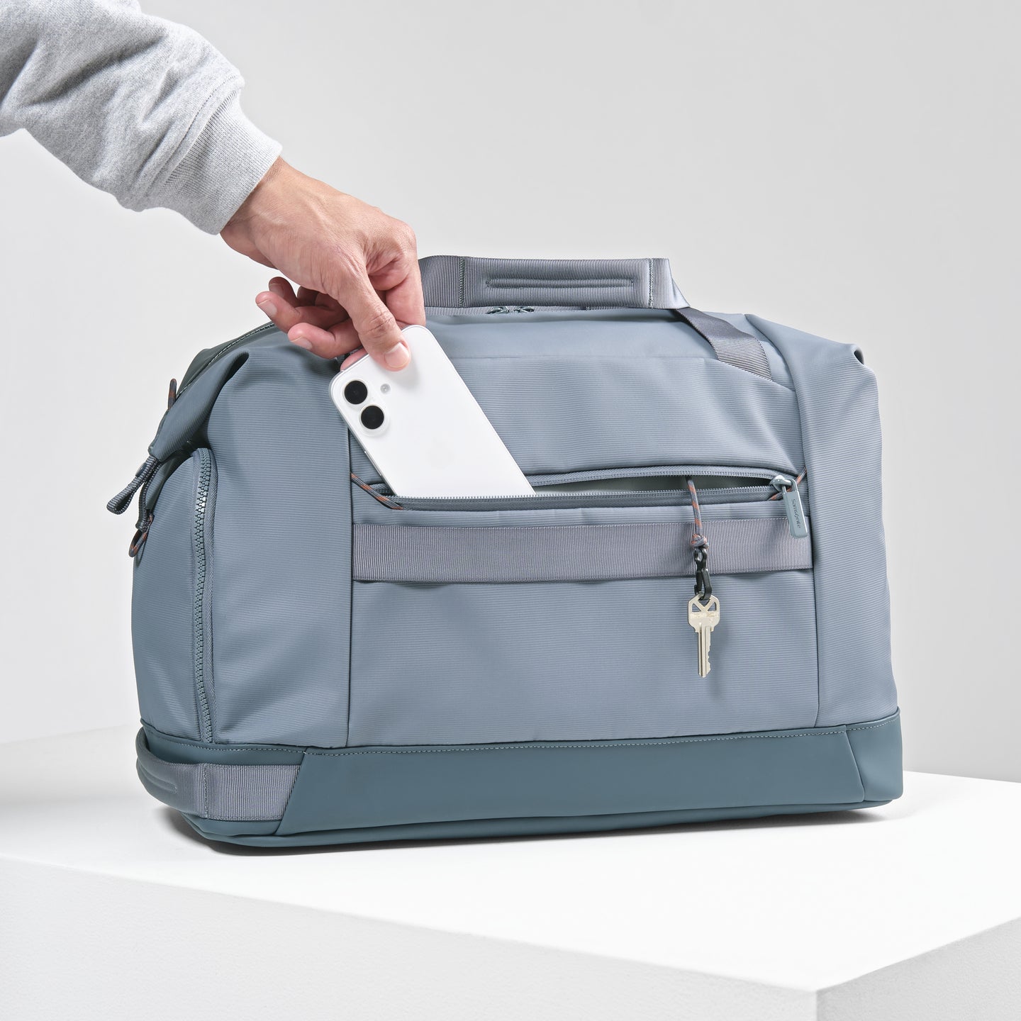 Designed for stashing your phone, keys, or wallet safely on the go.