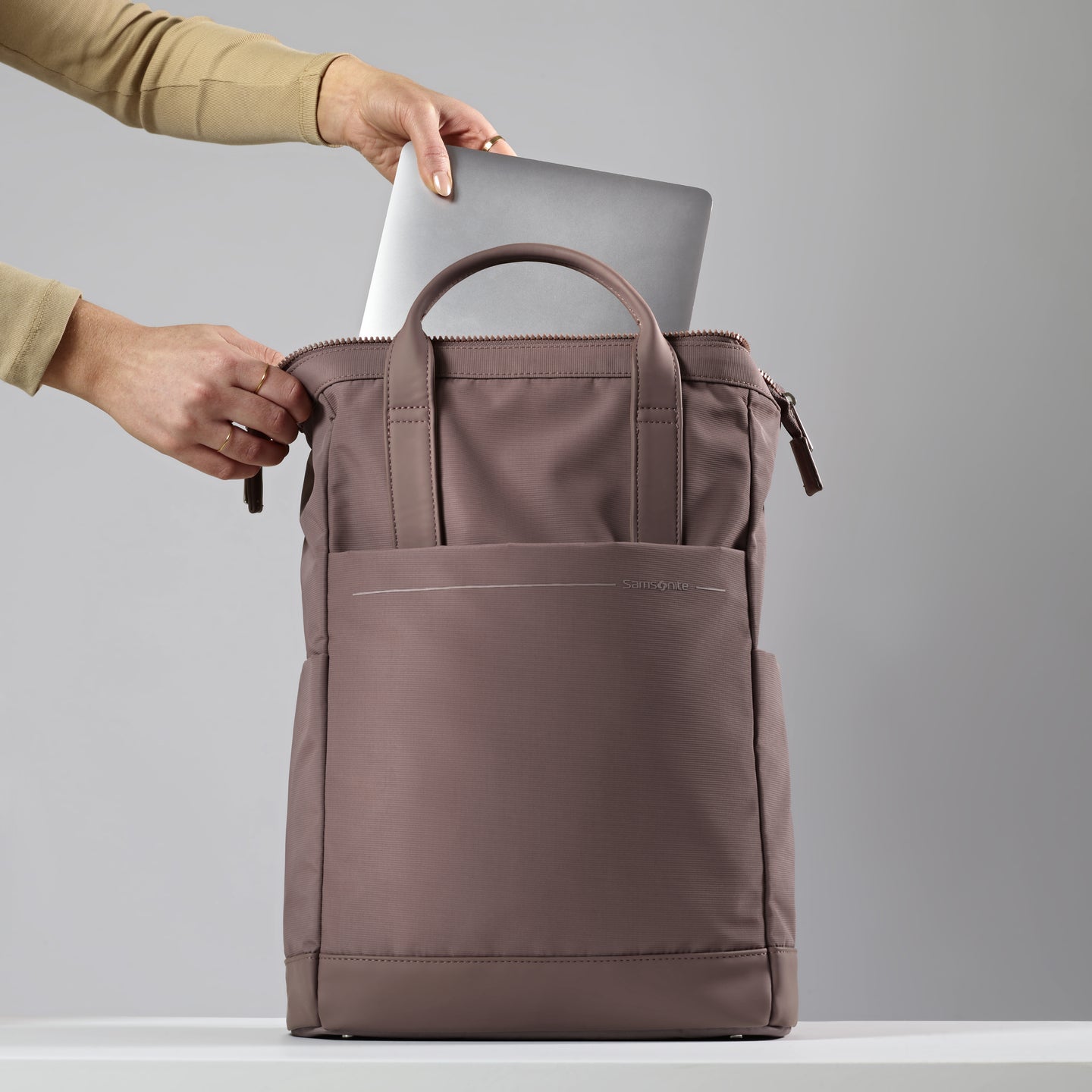 Always have your tech readily accessible with the Convertible Backpacks laptop compartment.